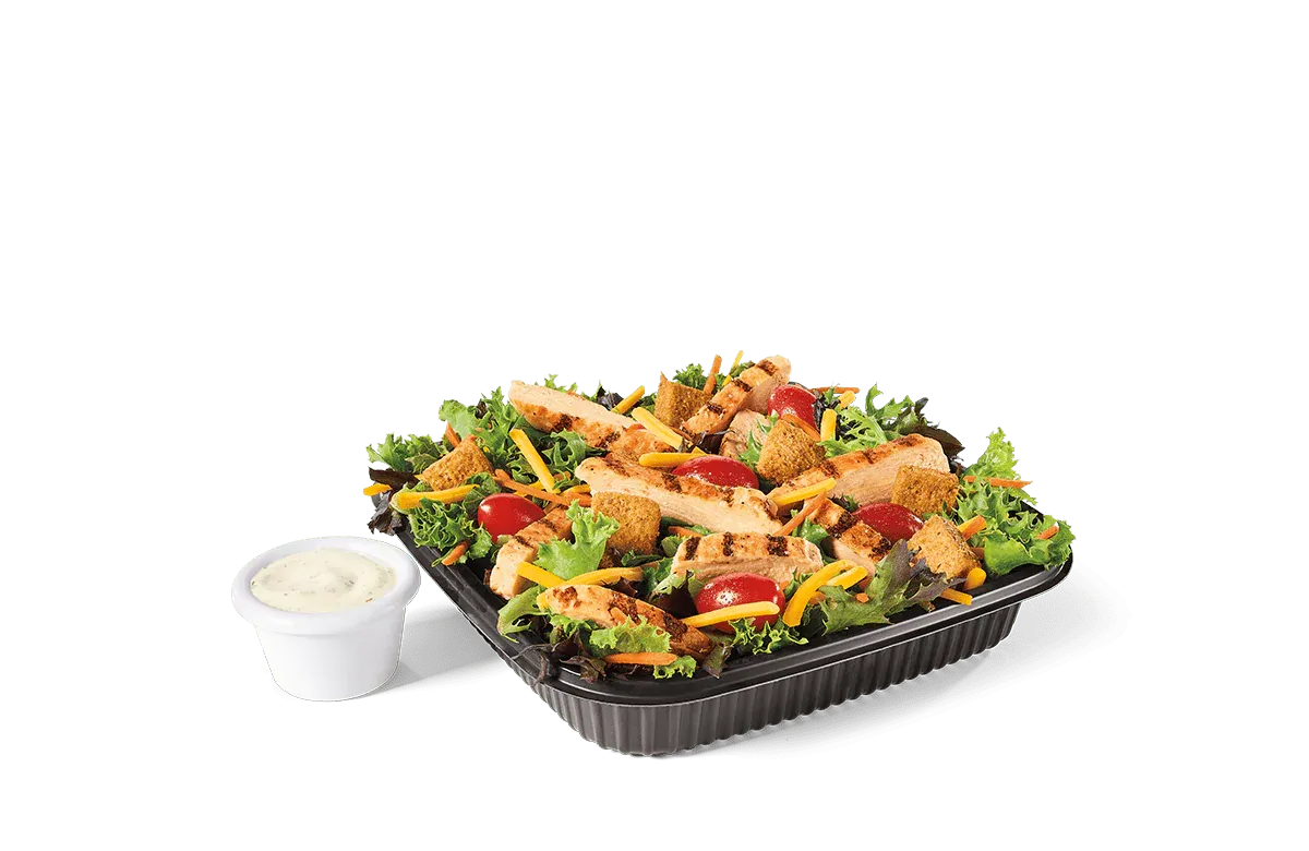 Crisp greens topped with grilled chicken for a lighter, protein-filled bowl.